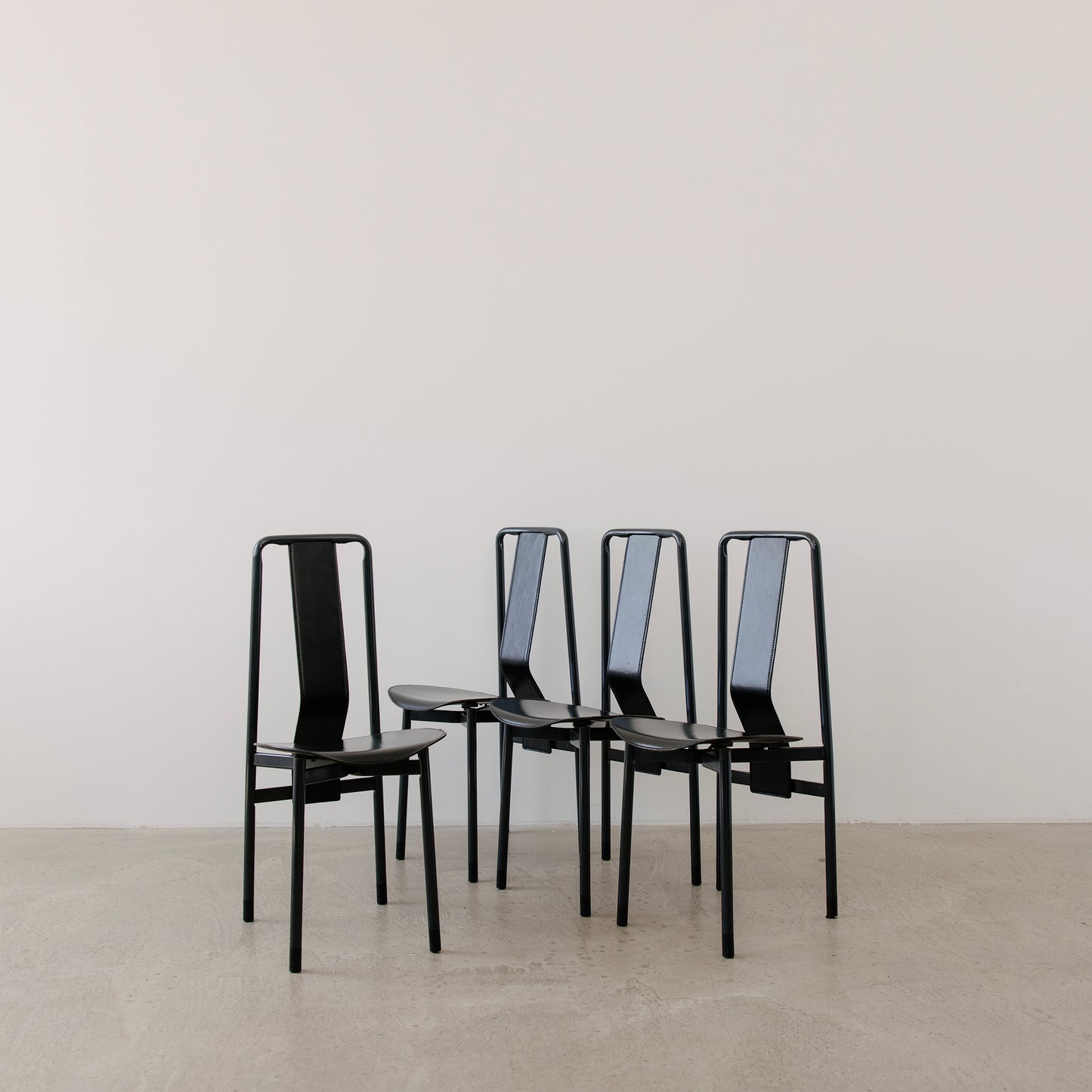 Irma dining chairs by Achille Castiglioni